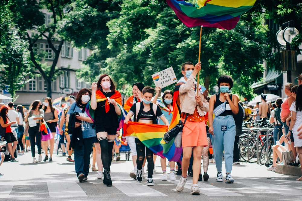 a group of people take part in the pride parade